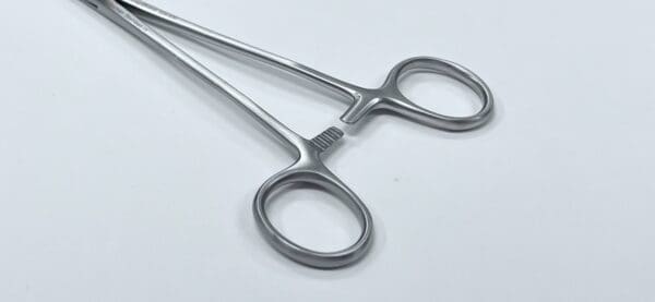 A JARCHO VULSELLUM FORCEP on a white surface.